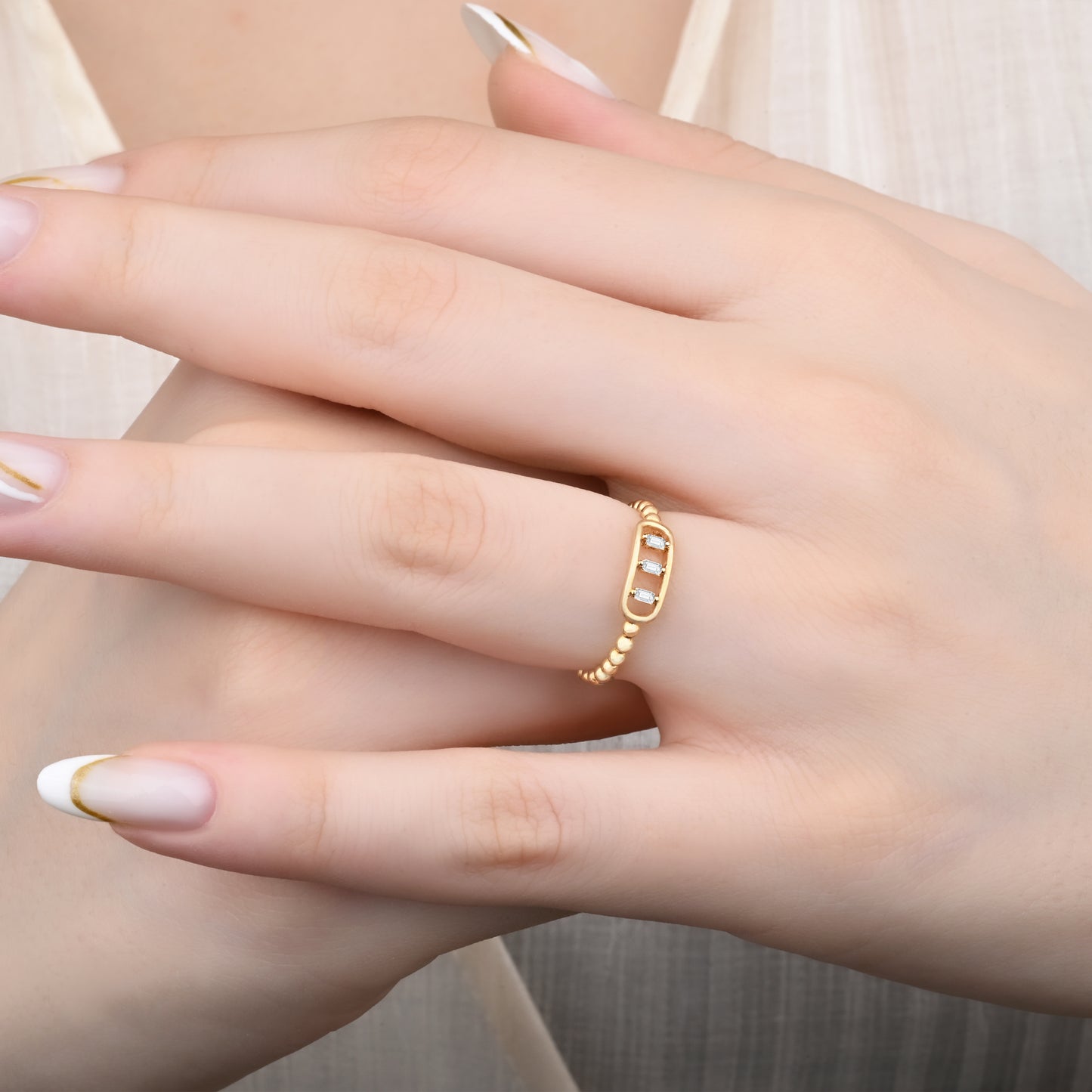 14K Yellow Gold Beaded Band Ring with Three Baguette Zirconia